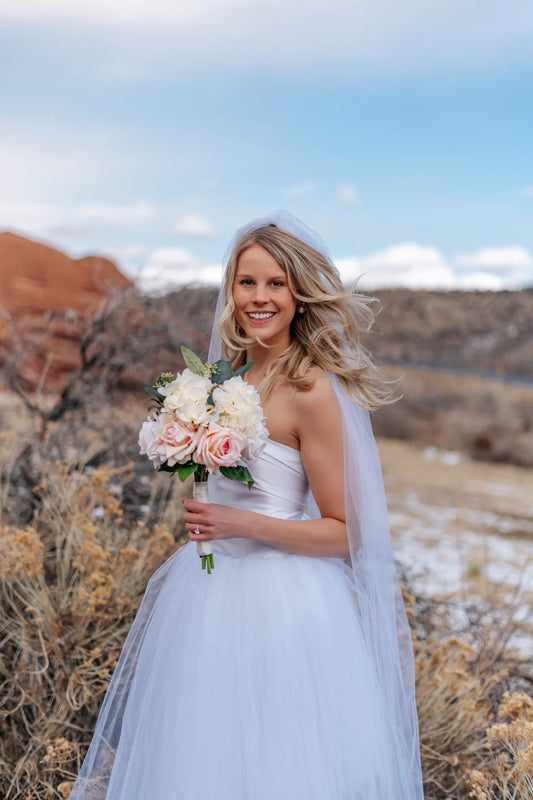 Blushing Bride with Pink Real Touch Faux Flowers for Wedding